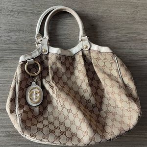 Monogram medium Gucci purse